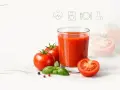 Szklanka soku pomidorowego z pomidorami i bazylią. Sok pomidorowy na co pomaga? Wspiera serce i odporność.